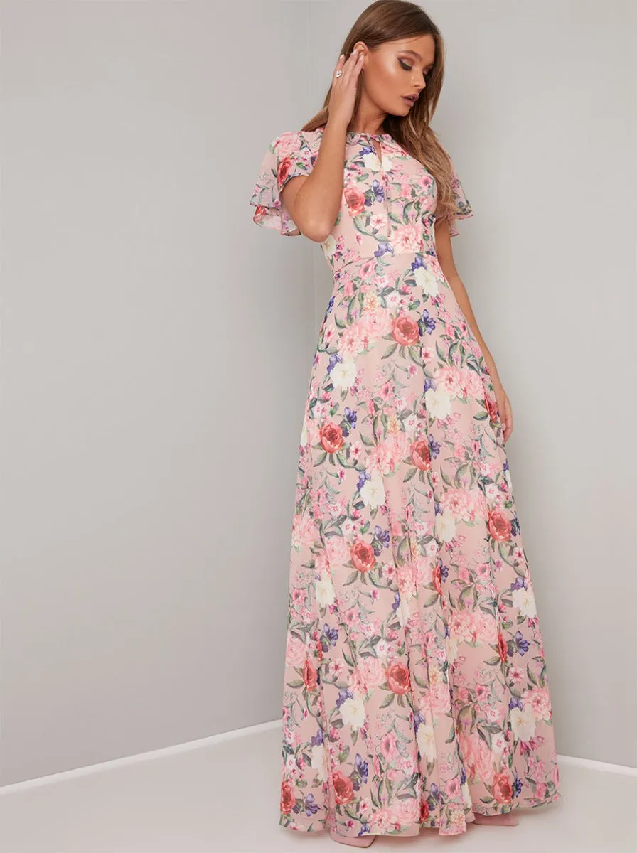 Angel Sleeve Floral Print Maxi Dress in Pink sold by Chi Chi London