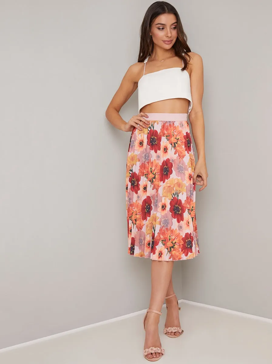 Crepe Floral Print Midi Skirt in Pink sold by Chi Chi London