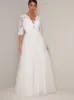 Bridal Sheer Sleeved Embroidered Wedding Dress in White sold by Chi Chi London