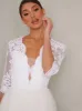 Bridal Sheer Sleeved Embroidered Wedding Dress in White sold by Chi Chi London