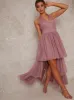 Halterneck Dip Hem Dress in Pink sold by Chi Chi London