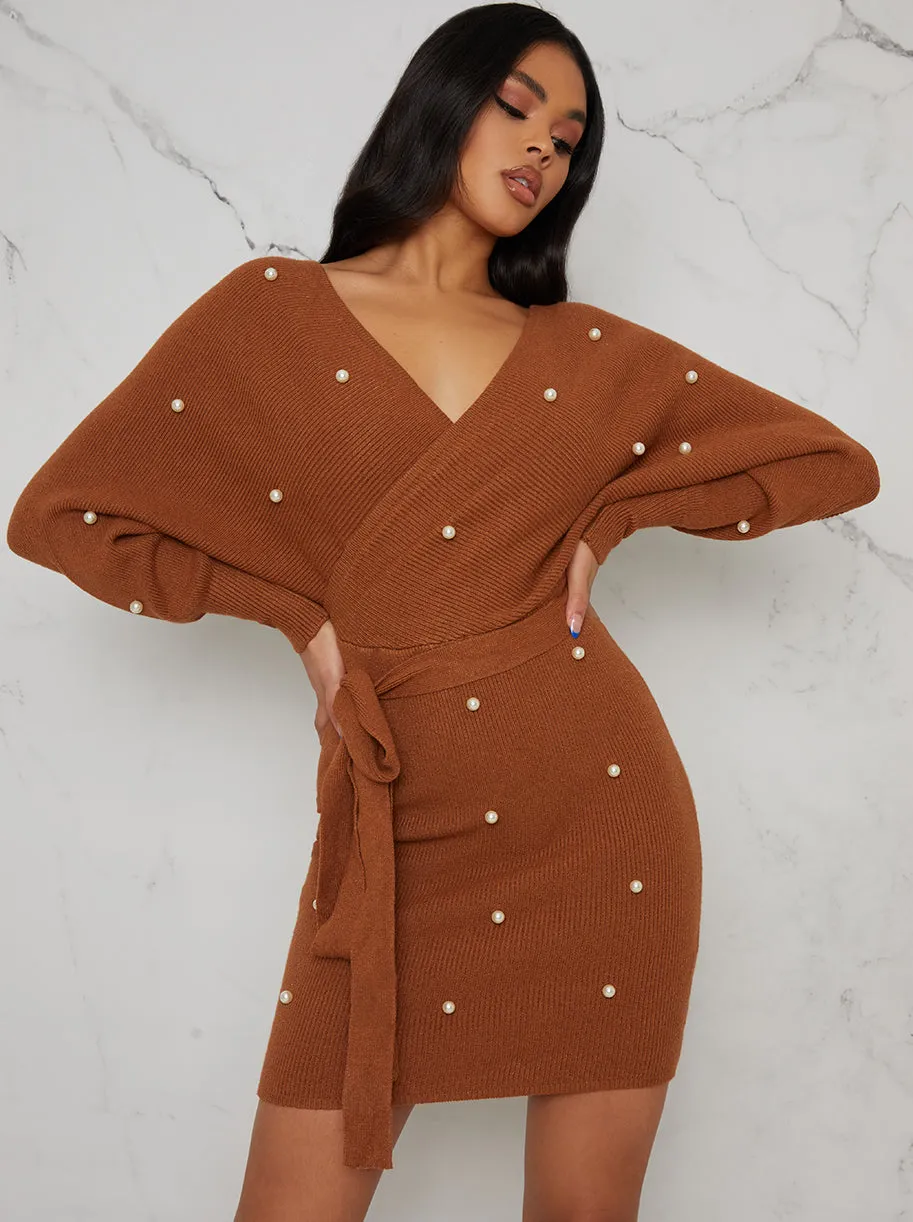 Pearl Design Wrap Detail Jumper Dress In Tan sold by Chi Chi London product image thumbnail 2
