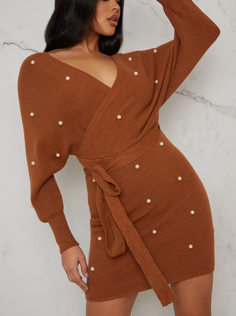 Pearl Design Wrap Detail Jumper Dress In Tan sold by Chi Chi London product image thumbnail 3