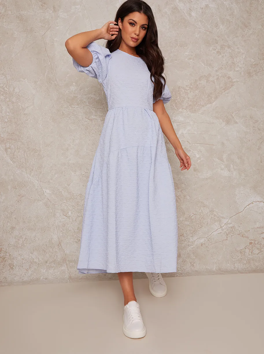 Puff Sleeve Tiered Midi Dress in Blue sold by Chi Chi London