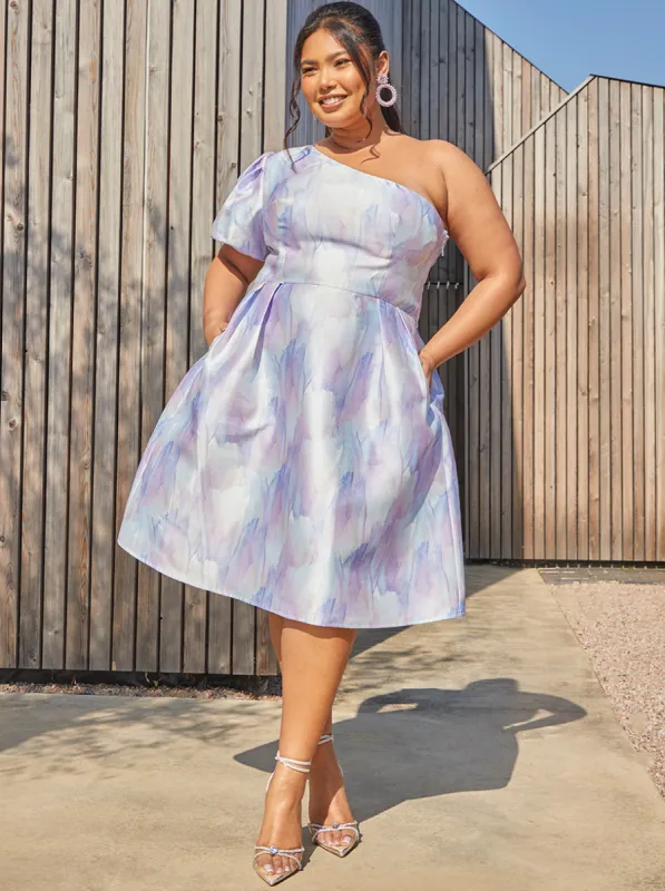 Plus Size One-Shoulder Puff Sleeve Watercolour Print Dress in Lilac sold by Chi Chi London