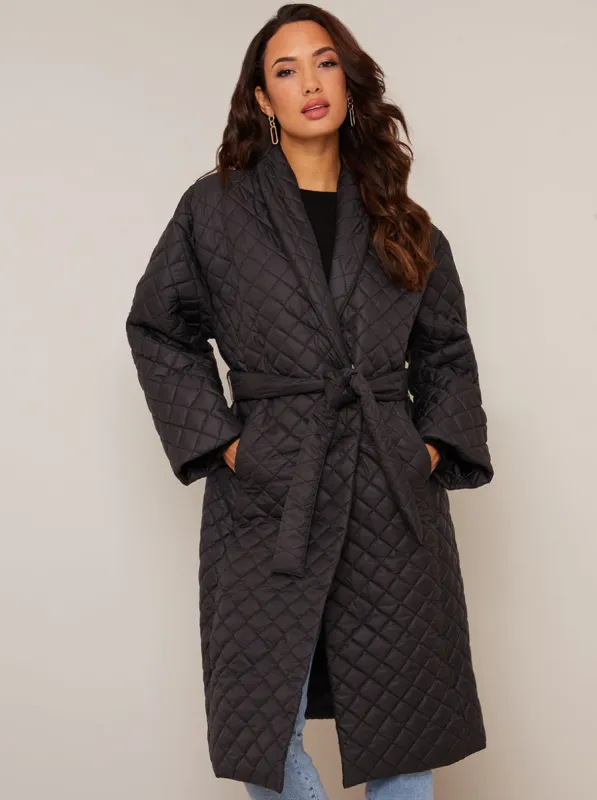 Diamond Quilted Longline Belted Coat in Black sold by Chi Chi London