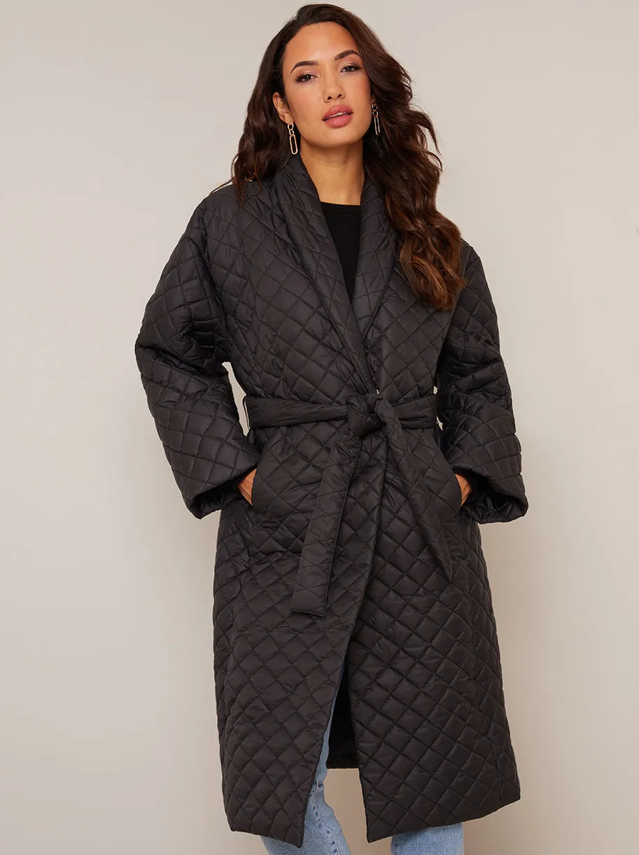 Diamond Quilted Longline Belted Coat in Black sold by Chi Chi London