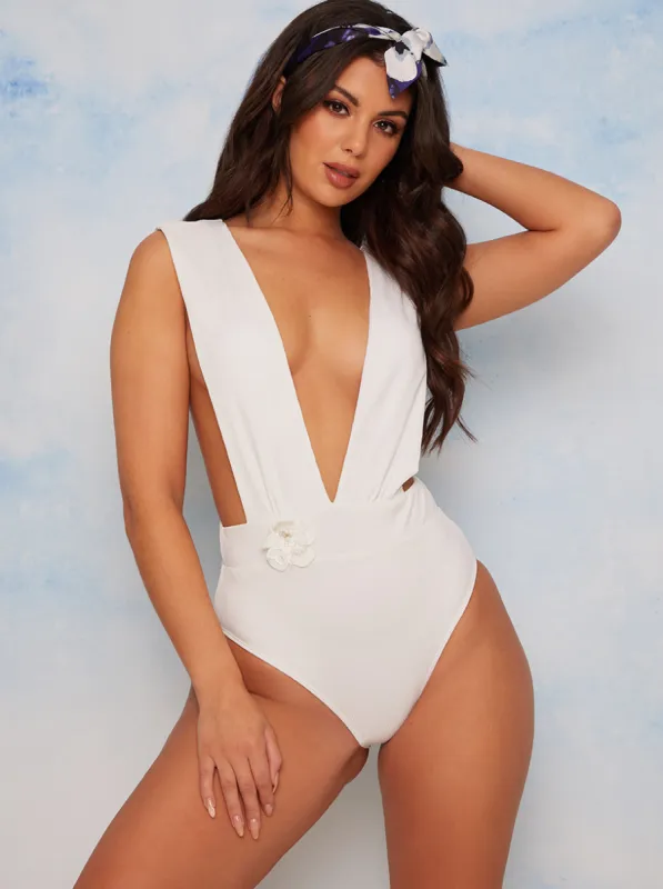 Floral Applique Plunge Swimsuit in Cream sold by Chi Chi London