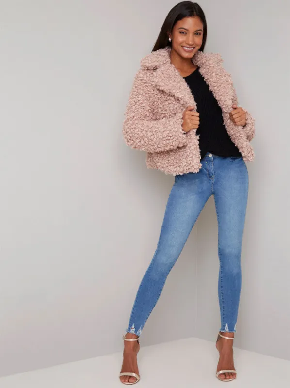 Short Teddy Jacket in Pink sold by Chi Chi London