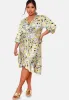 Plus Size Twist Front Abstract Midi Dress in Silver sold by Chi Chi London