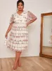 Plus Size V Neck Floral Embroidered Lace Midi Dress in Pink sold by Chi Chi London