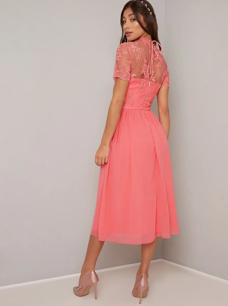 Embroidered Short Sleeved Midi Dress in Coral sold by Chi Chi London product image thumbnail 4