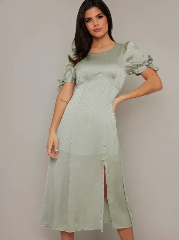 Spot Print Puff Sleeved Midi Dress in Green made by Chi Chi London