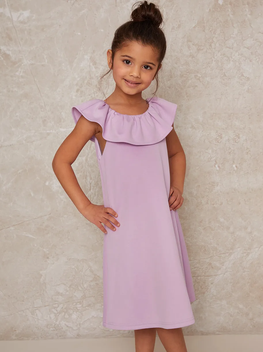Girls Ruffle Neck Smock Dress in Purple sold by Chi Chi London