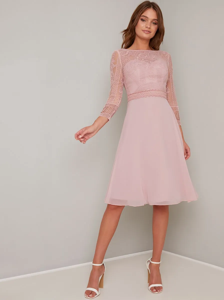 Lace Bodice Sheer Sleeved Chiffon Midi Dress in Brown sold by Chi Chi London