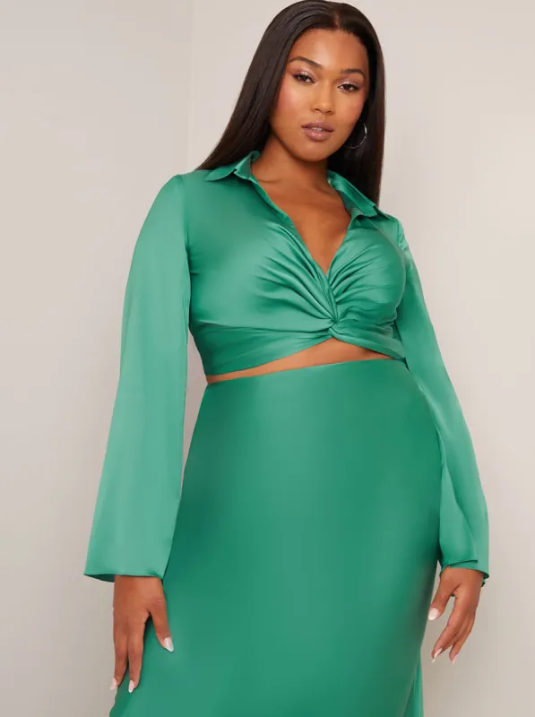 Long Sleeve V Neck Satin Twist Detail Top in Green sold by Chi Chi London