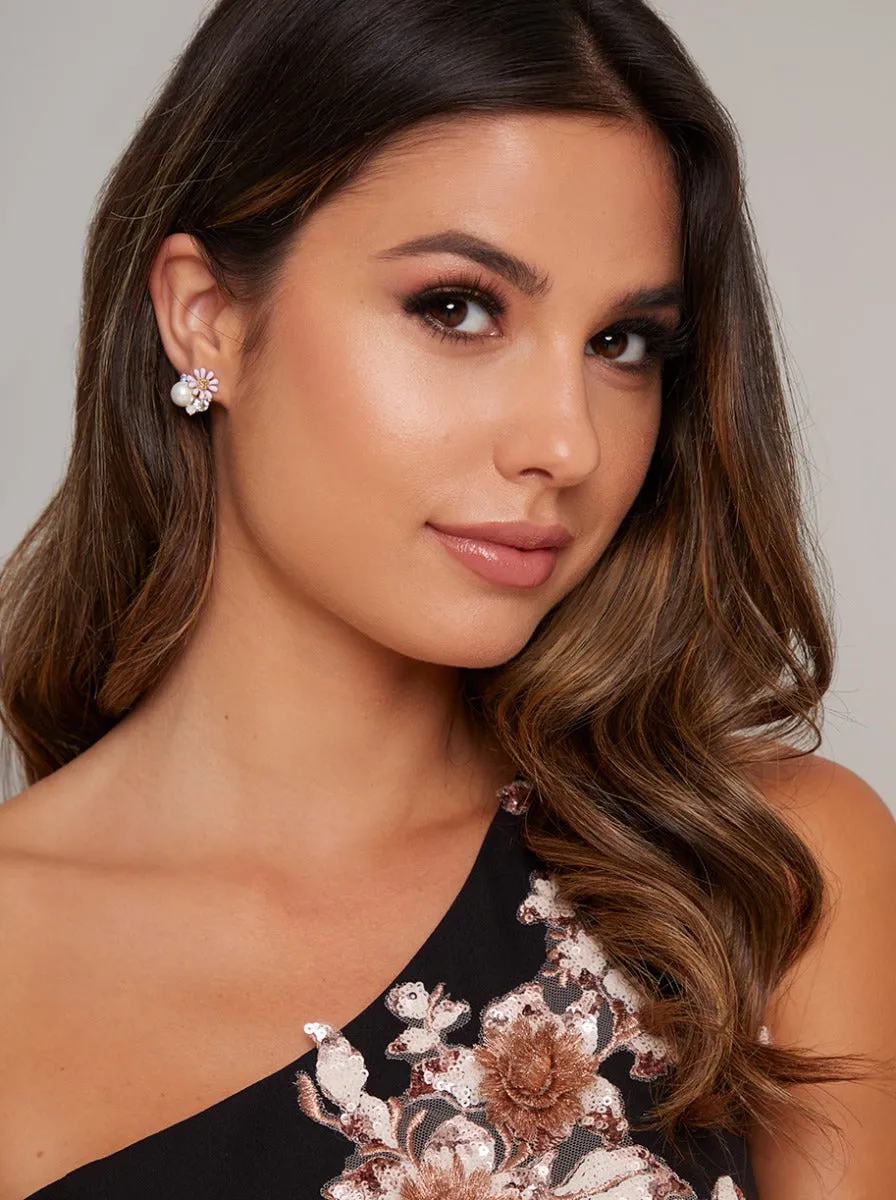 Daisy Pearl Stud Earrings in White sold by Chi Chi London