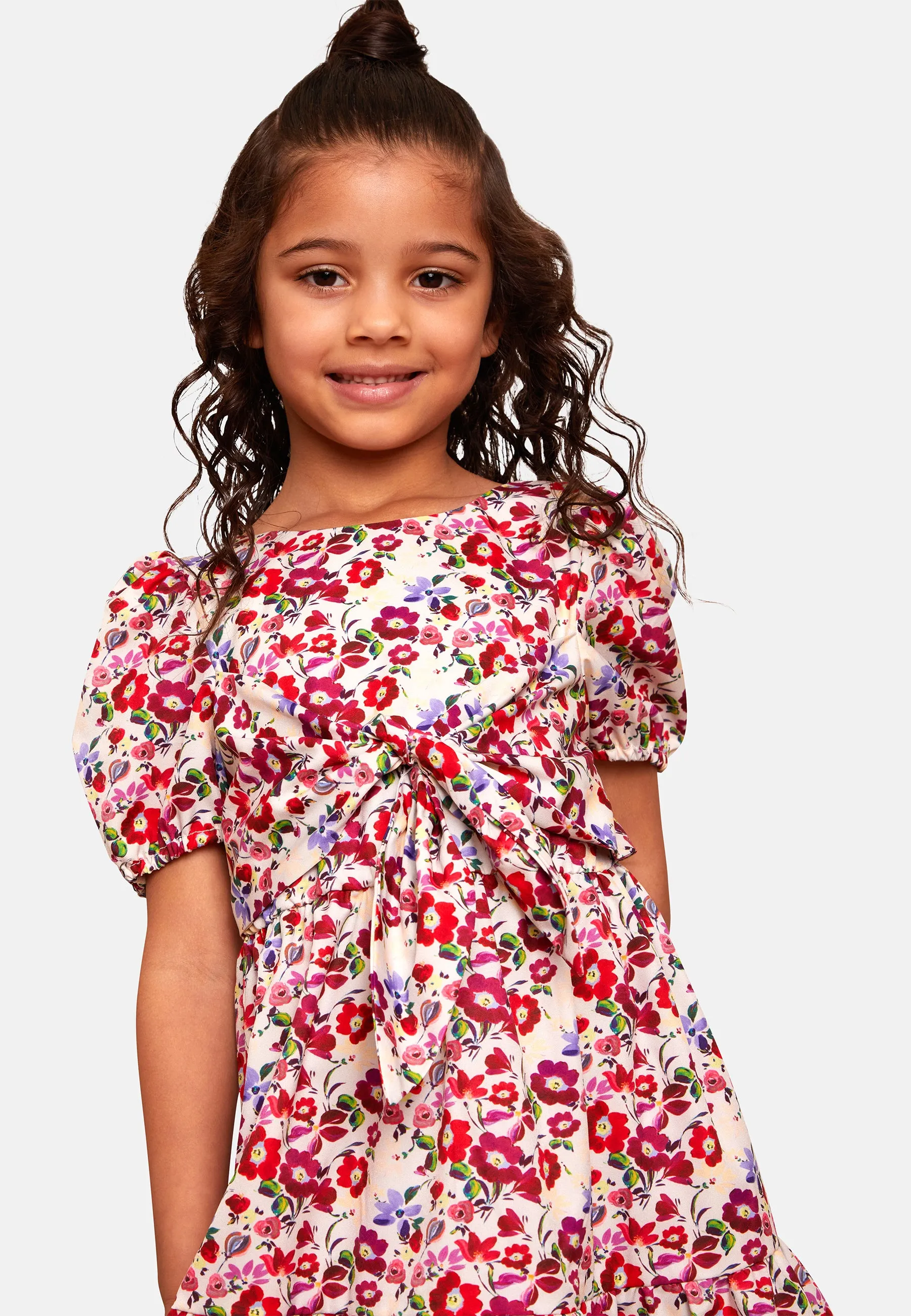 Younger Girls Puff Sleeve Tie Detail Floral Dress in White sold by Chi Chi London product image thumbnail 5