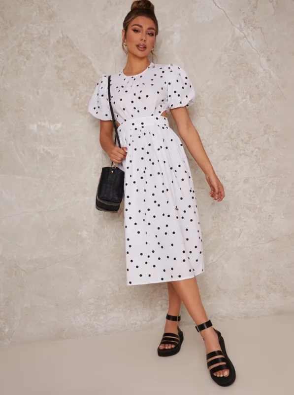 Polka Dot Open Back Puff Sleeve Midi Smock Dress in White sold by Chi Chi London