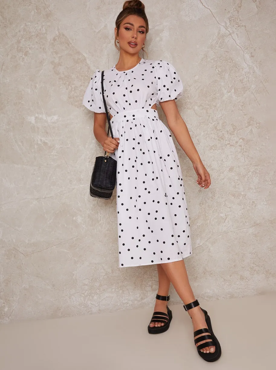 Polka Dot Open Back Puff Sleeve Midi Smock Dress in White sold by Chi Chi London