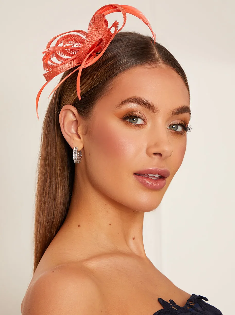 Looped Sinamay Fascinator in Coral sold by Chi Chi London