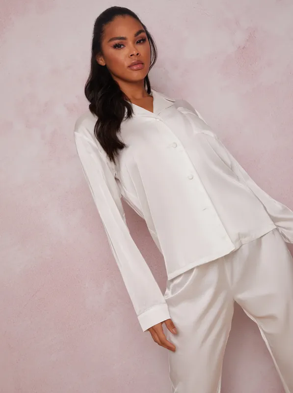Long Sleeved Silky Pyjama Set in White sold by Chi Chi London