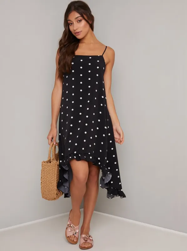 Spot Print Cami Dip Hem Dress in Black sold by Chi Chi London