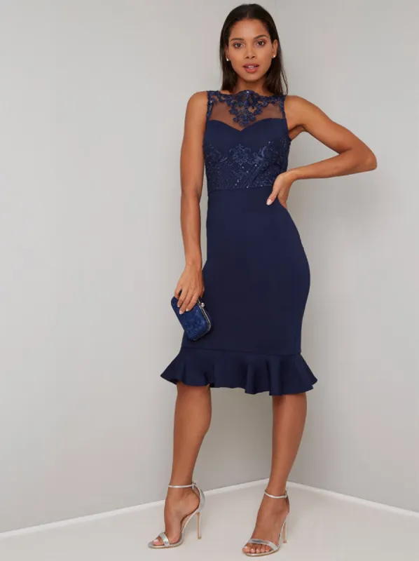 Embroidered Peplum Hem Bodycon Dress in Blue sold by Chi Chi London