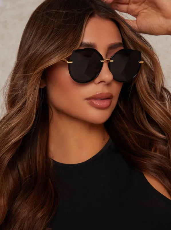 Oversized Rounded Cat Eye Sunglasses in Black sold by Chi Chi London