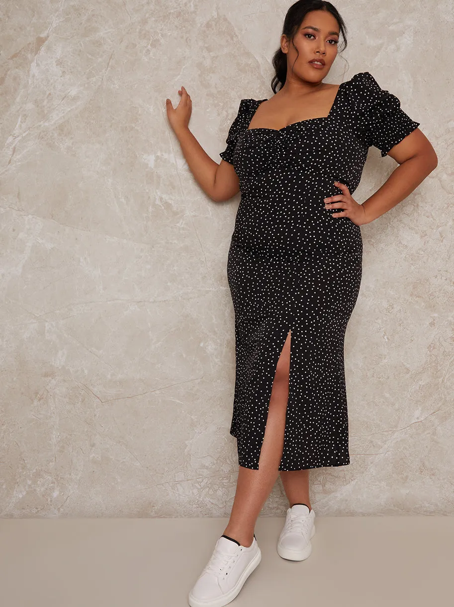 Plus Size Polka Dot Puff Sleeve Midi Dress in Black sold by Chi Chi London
