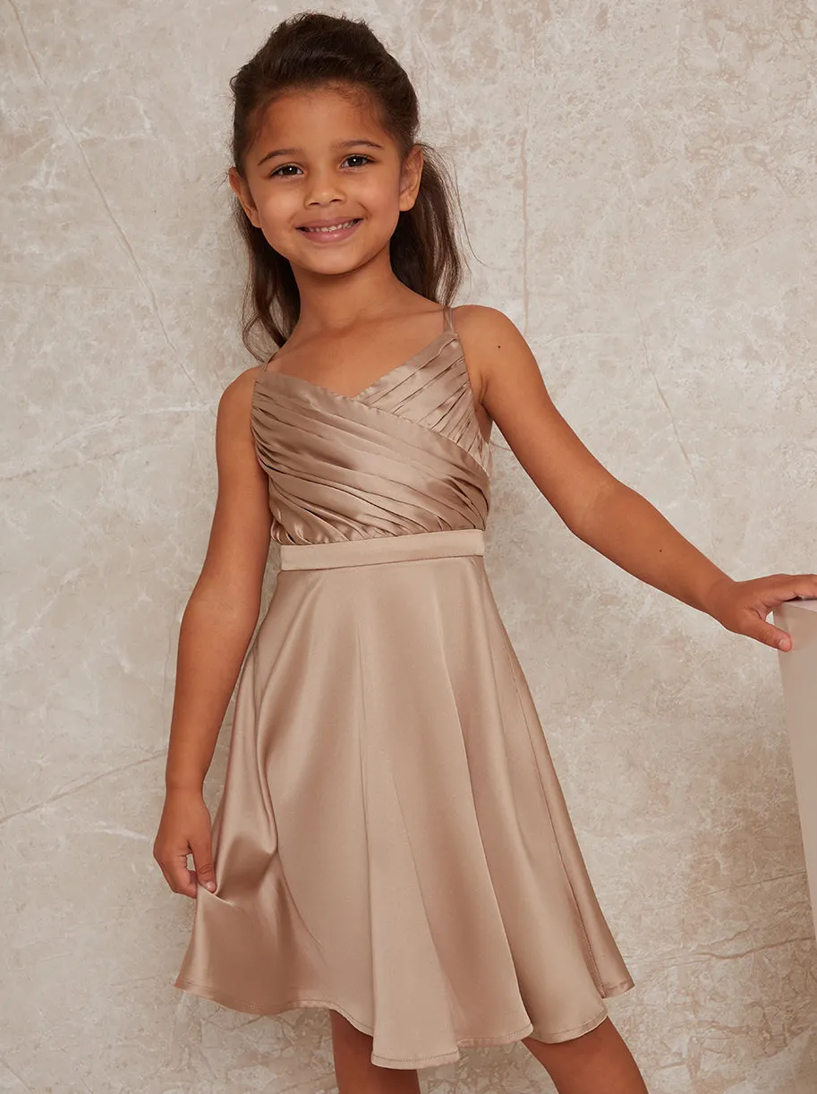 Girls Pleat Bodice Satin Finish Dress in Champagne sold by Chi Chi London