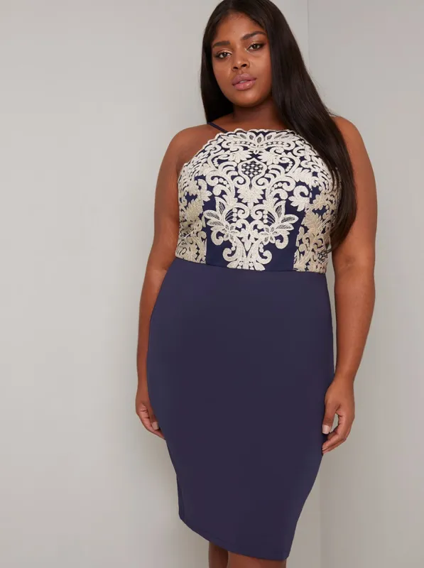 Halter Neck Embroidered Bodycon Dress in Navy sold by Chi Chi London