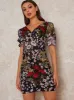 V Neck Puff Sleeve Lace Mini Dress in Black sold by Chi Chi London