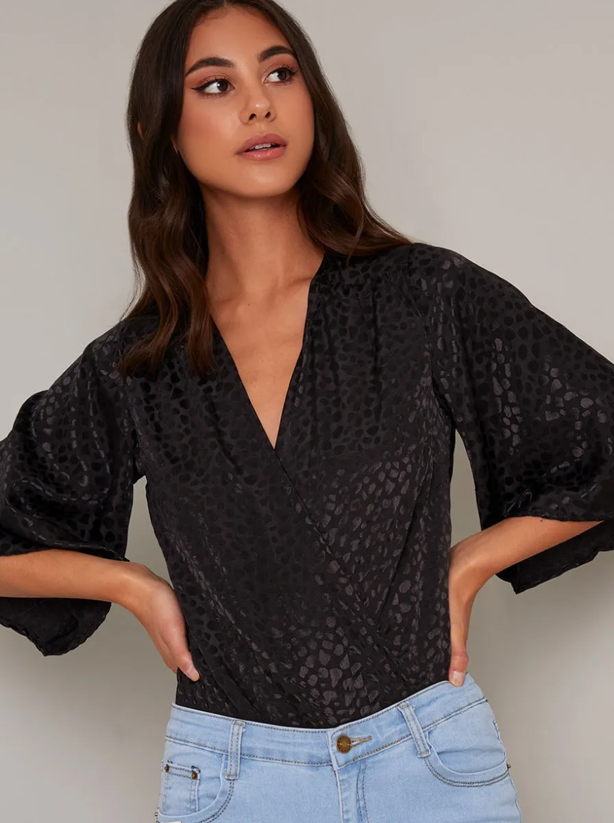 Wrap Style Flared Sleeved Bodysuit in Black sold by Chi Chi London product image thumbnail 3