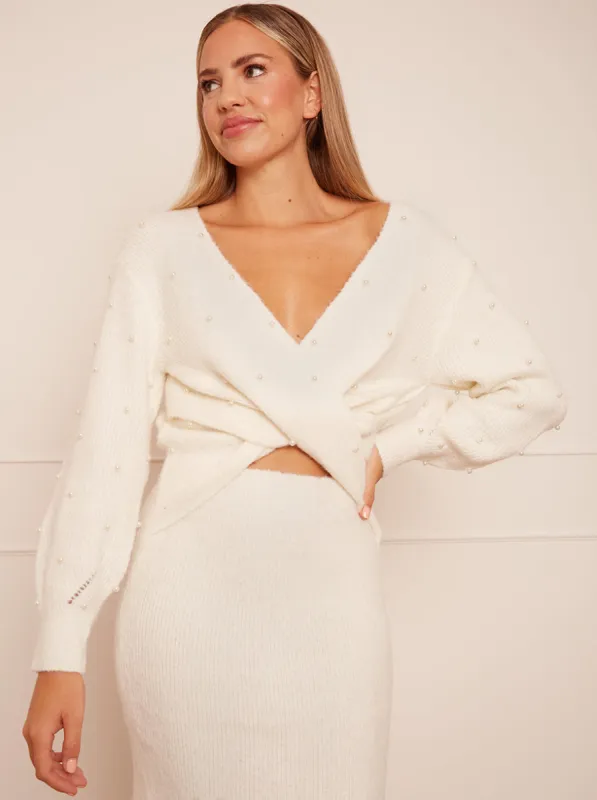 Pearl Detail Twist Front Knitted Midi Dress in Cream sold by Chi Chi London