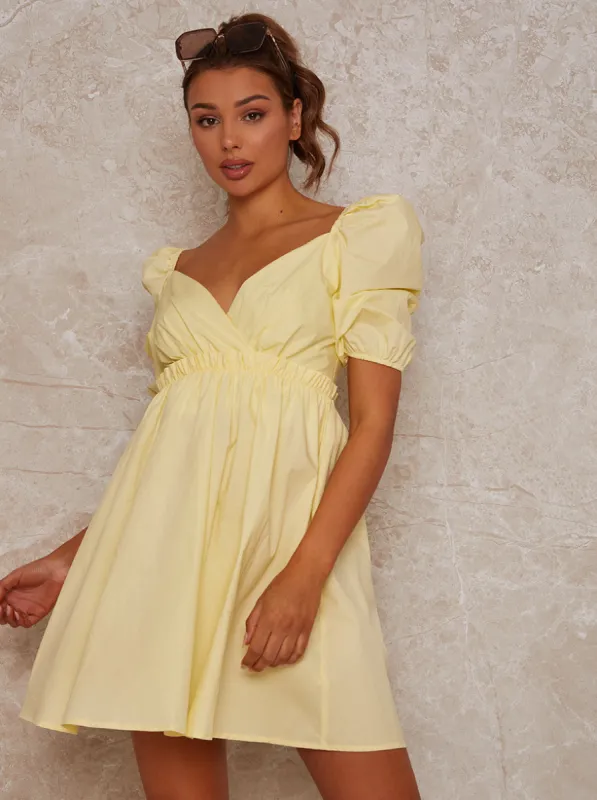 Puff Sleeve Mini Day Dress in Yellow sold by Chi Chi London