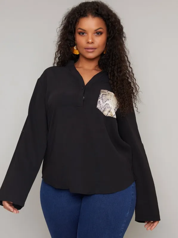 Plus Size Pocket Detail Long Sleeved Top in Black sold by Chi Chi London