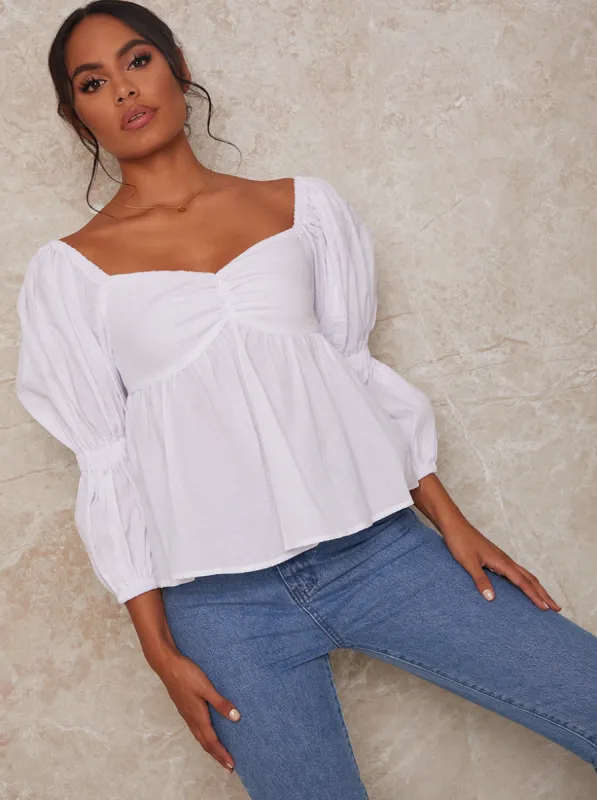 Puff Sleeve V Neck Blouse in White sold by Chi Chi London