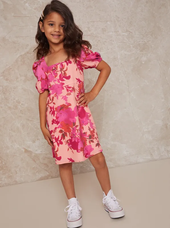 Girls Floral Print Puff Sleeve Button Up Dress in Pink sold by Chi Chi London