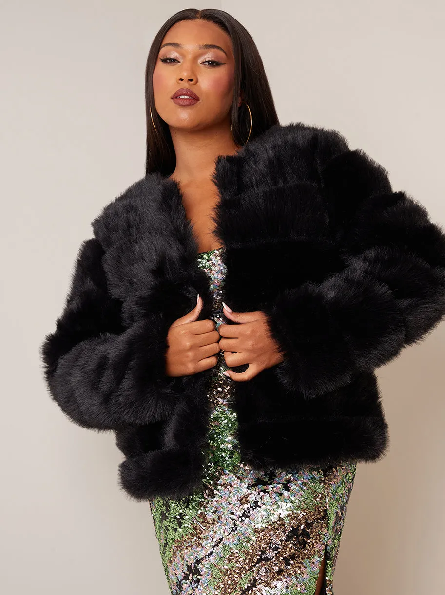 Faux Fur Stripe Jacket in Black sold by Chi Chi London