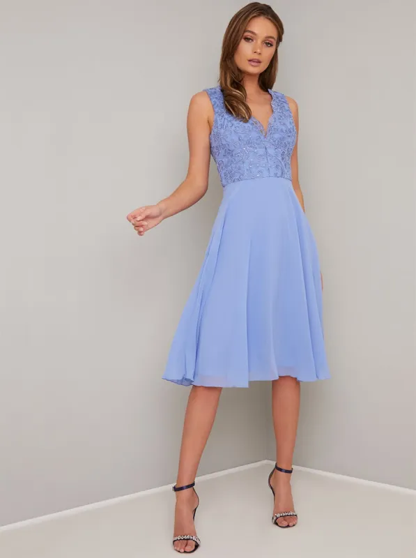 Lace V Neck Chiffon Midi Dress in Blue sold by Chi Chi London