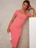 Cut Out Bodycon Dress with Puff Sleeve in Orange sold by Chi Chi London