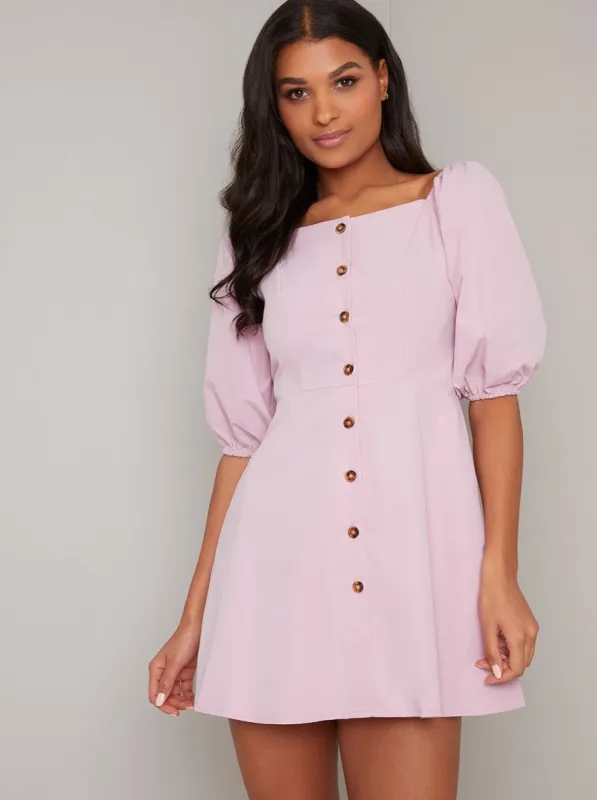 Puff Sleeve Buttoned Mini Dress in Pink sold by Chi Chi London