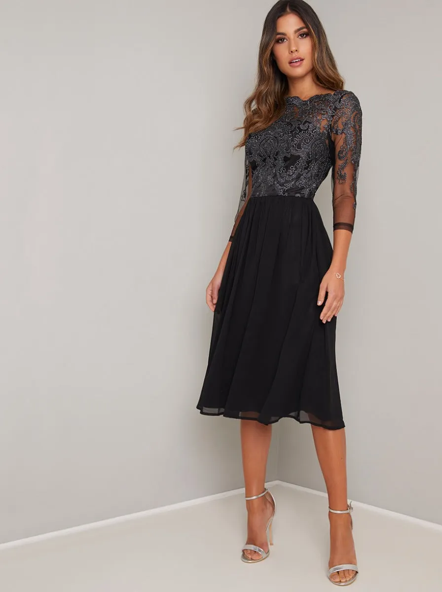 Midi Dress with Baroque Style Lace Design in Black sold by Chi Chi London
