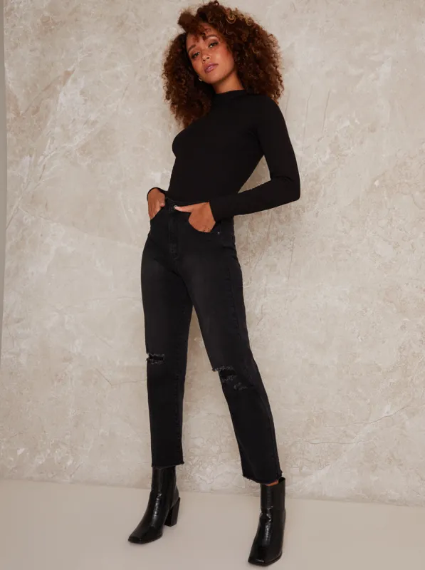 Mid Rise Slim Fit Ripped Washed Look Jeans in Black sold by Chi Chi London