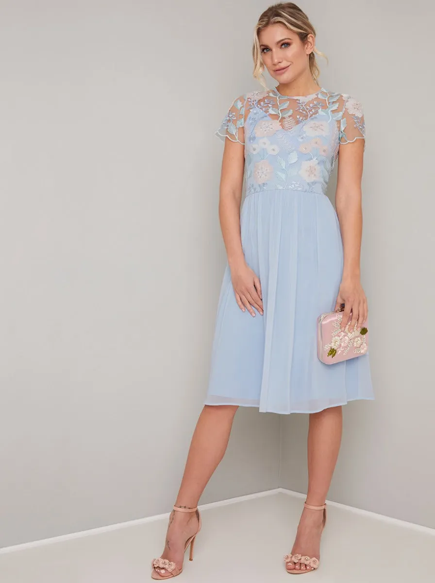 Cap Sleeve Embroidered Chiffon Midi Dress in Blue sold by Chi Chi London