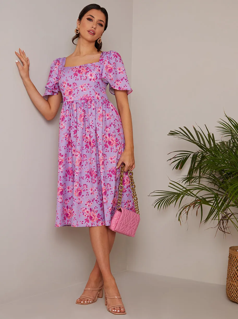 Square Neck Ditsy Floral Midi Dress in Purple sold by Chi Chi London