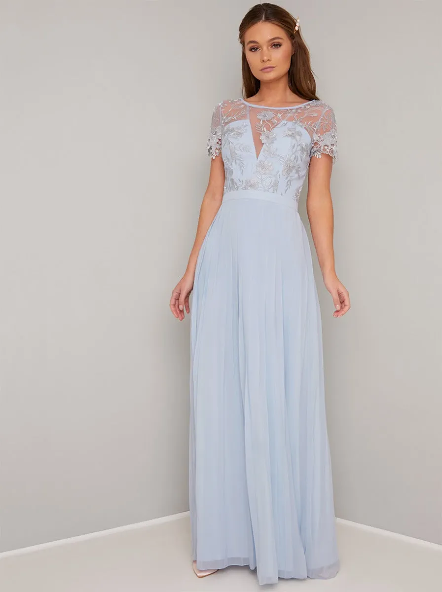 Sheer Lace Pleated Maxi Dress in Blue sold by Chi Chi London