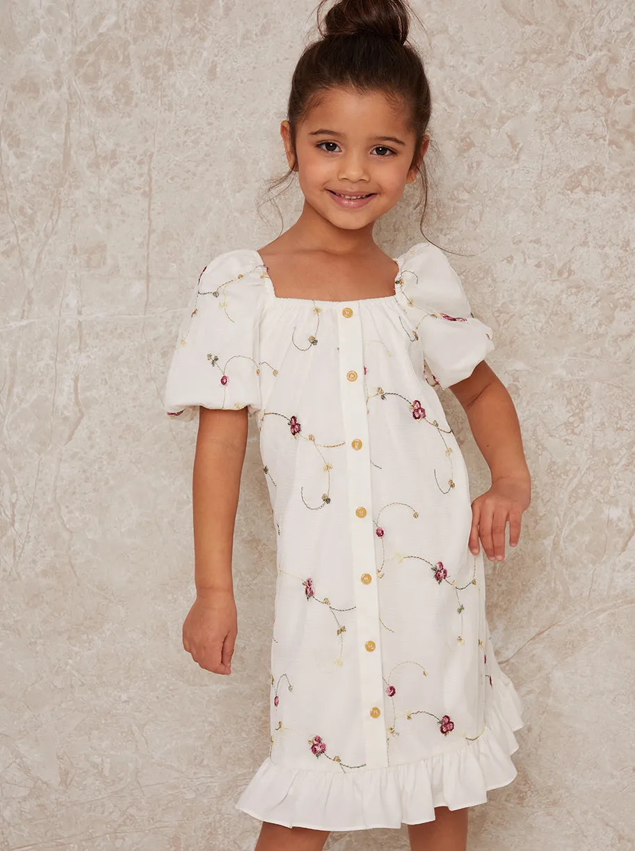 Girls Short Sleeve Floral Dress with Button Detail in White sold by Chi Chi London