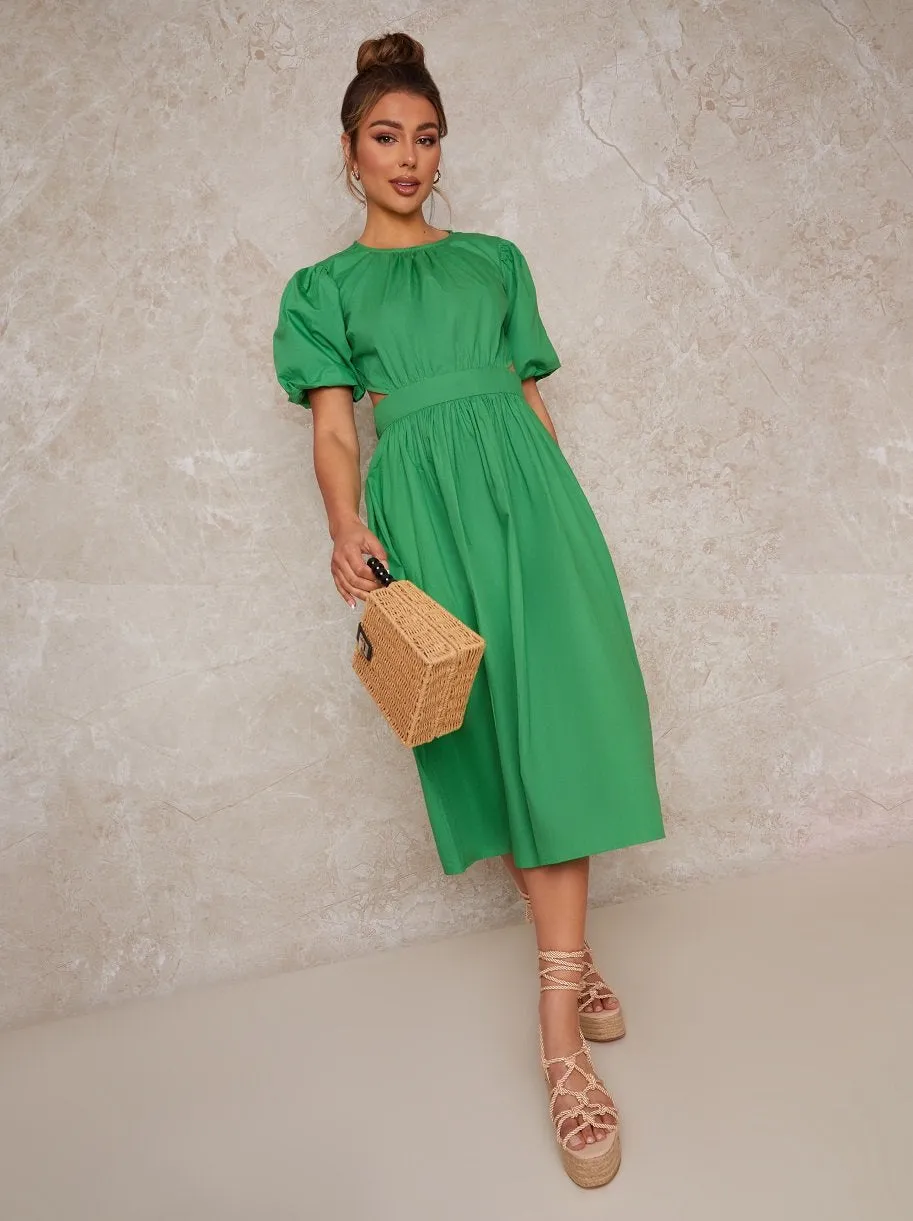 Open Back Puff Sleeve Midi Smock Dress in Green sold by Chi Chi London